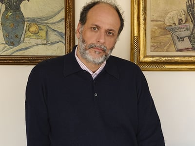 Luca Guadagnino receives the Cartier Glory to the Filmmaker Award at the Venice Film Festival. 