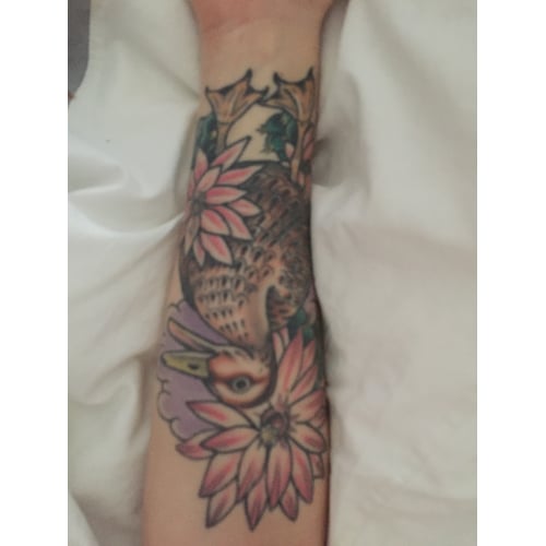 Tatoeage onderarm Links