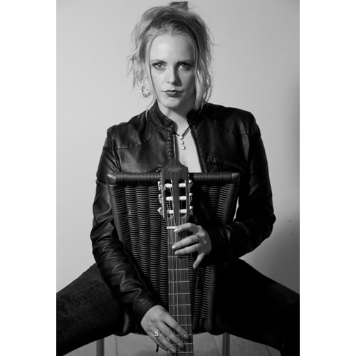 met gitaar