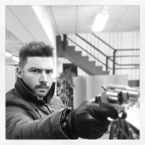 Acting with a gun