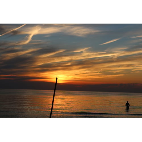 Sonsondergang bij het strand