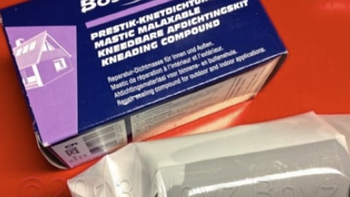 Adhesive material